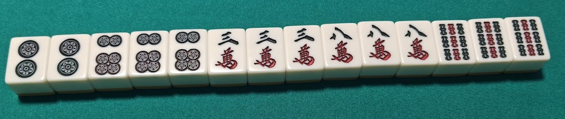 役満である四暗刻（スーアンコー）の完成形の牌姿
